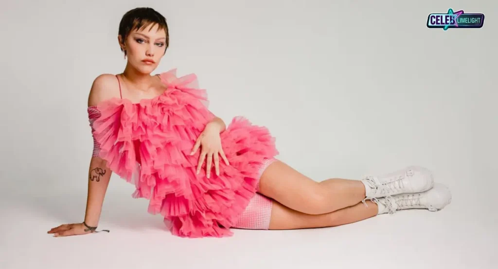 The image appears to be from a photoshoot,  related to her album Childstar 